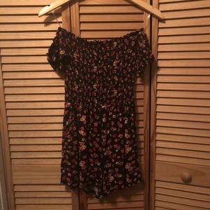 Off the shoulder black floral romper